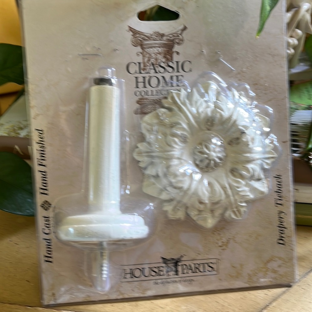 Drapery tieback. Hand cast and finished. Cream flower. New with tags